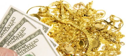 Ticarət savaşı: qızıl bahalaşır, dollar dəyər itirir